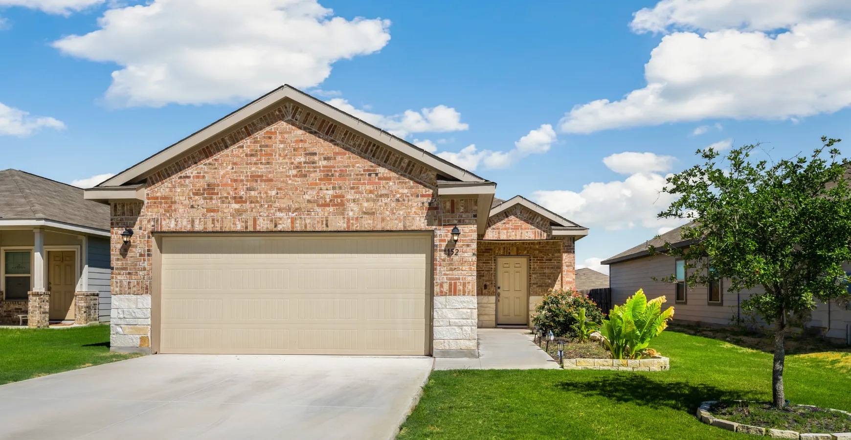 Traditional garage exterior in Los Angeles before ADU conversion with garage door and driveway